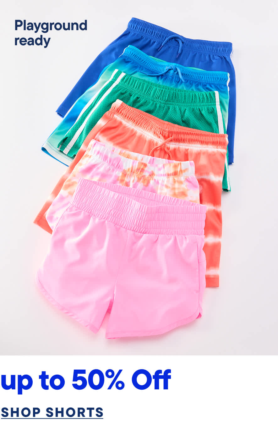 A colorful assortment of playground-ready shorts in various vibrant hues, including blue, green, and pink, with a promotional message offering up to 50% off on the shorts.