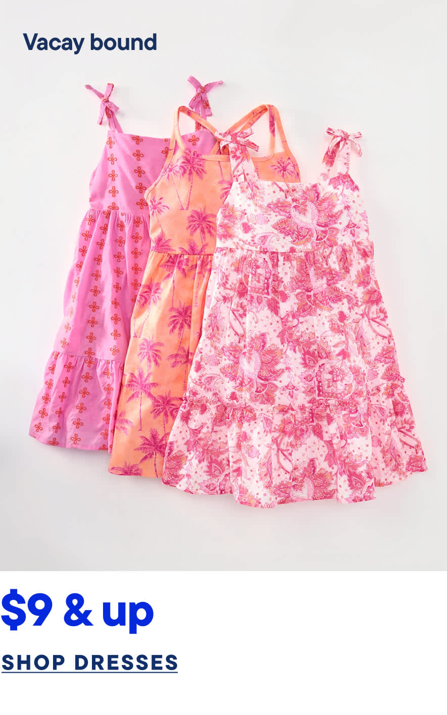 The image displays a collection of colorful, floral-patterned dresses in various shades of pink, arranged on a plain white background. The dresses appear to be part of a "Vacay bound" clothing line, as indicated by the text overlay.