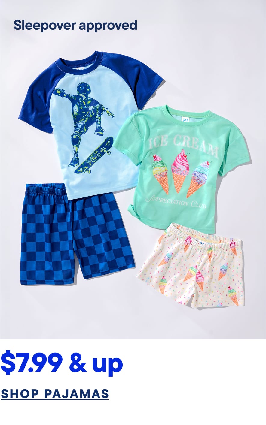 The image displays a collection of children's pajamas, including a blue raglan t-shirt with a skateboarding graphic, a mint green t-shirt with an ice cream cone design, and patterned blue and white shorts.