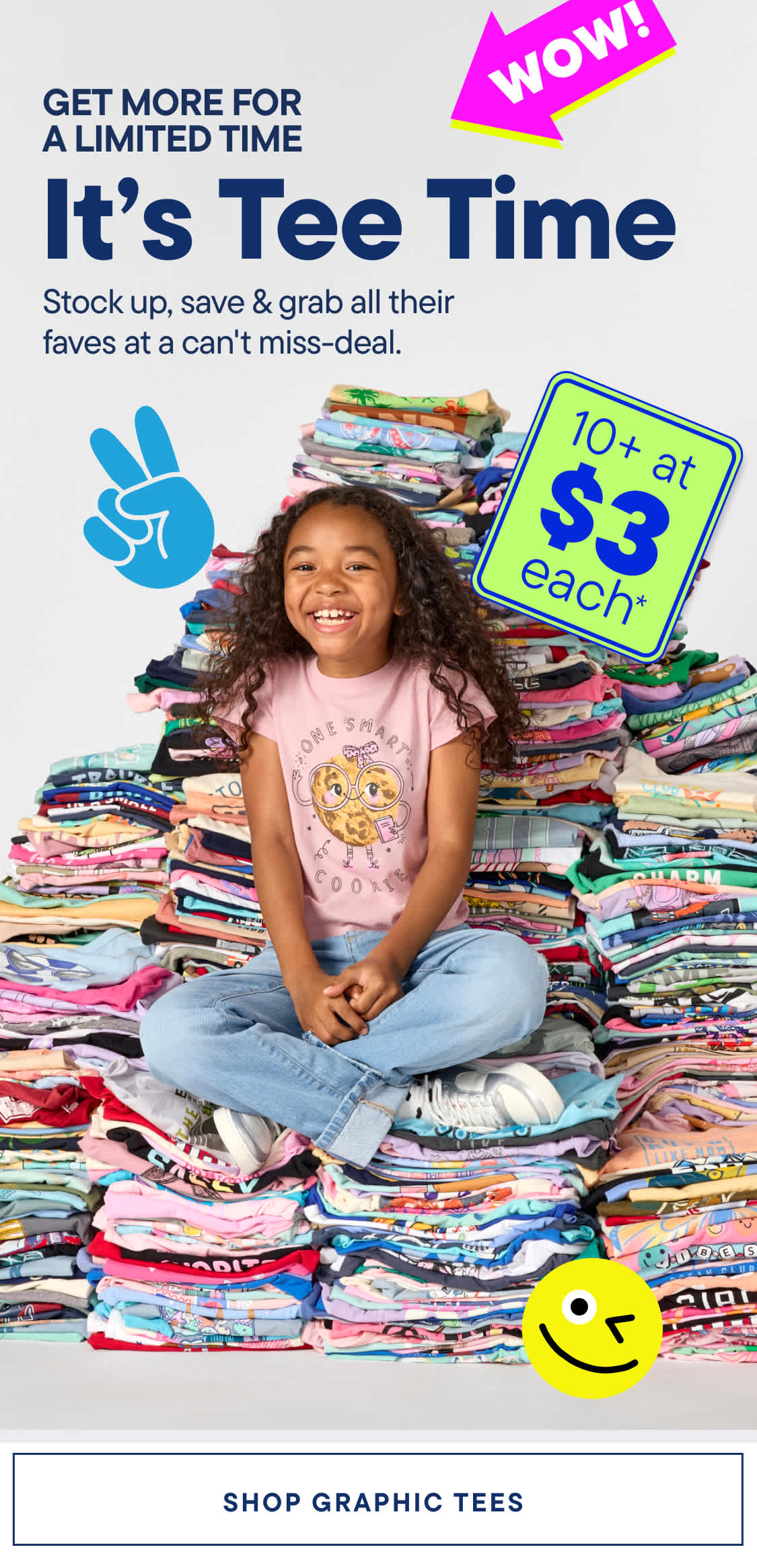 A smiling girl sits on a large pile of colorful t-shirts, with text advertising a deal in the foreground and a peace sign in the background.