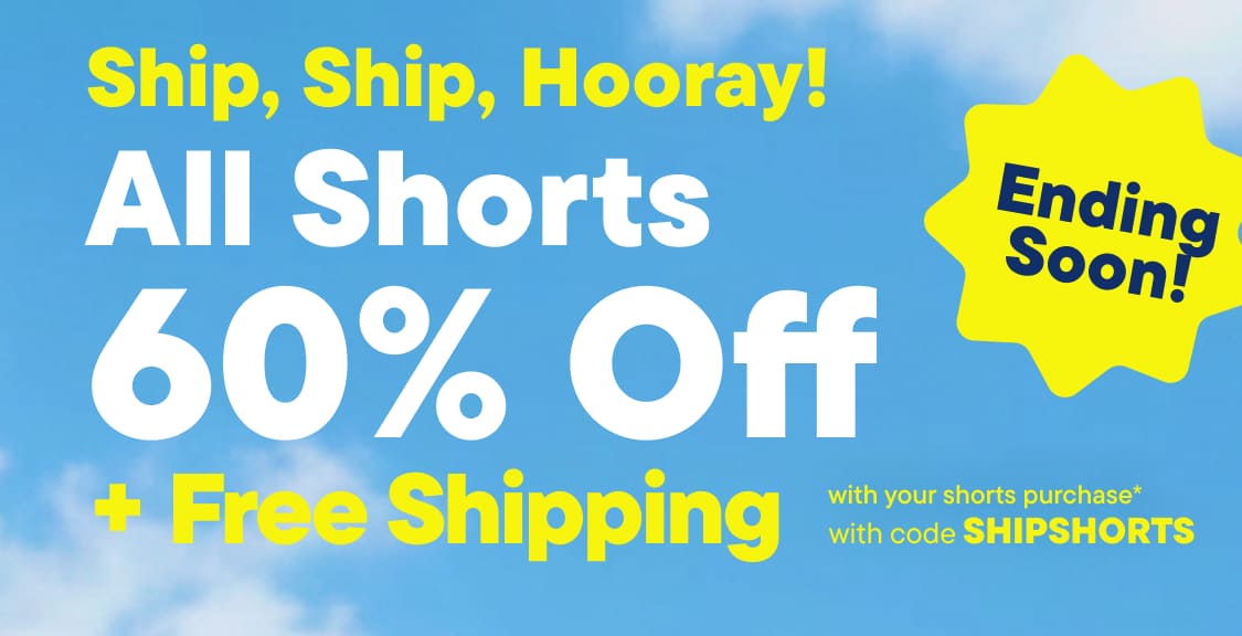 A young girl in shorts and a blue top stands on a beach with a sale advertisement for shorts in the foreground.