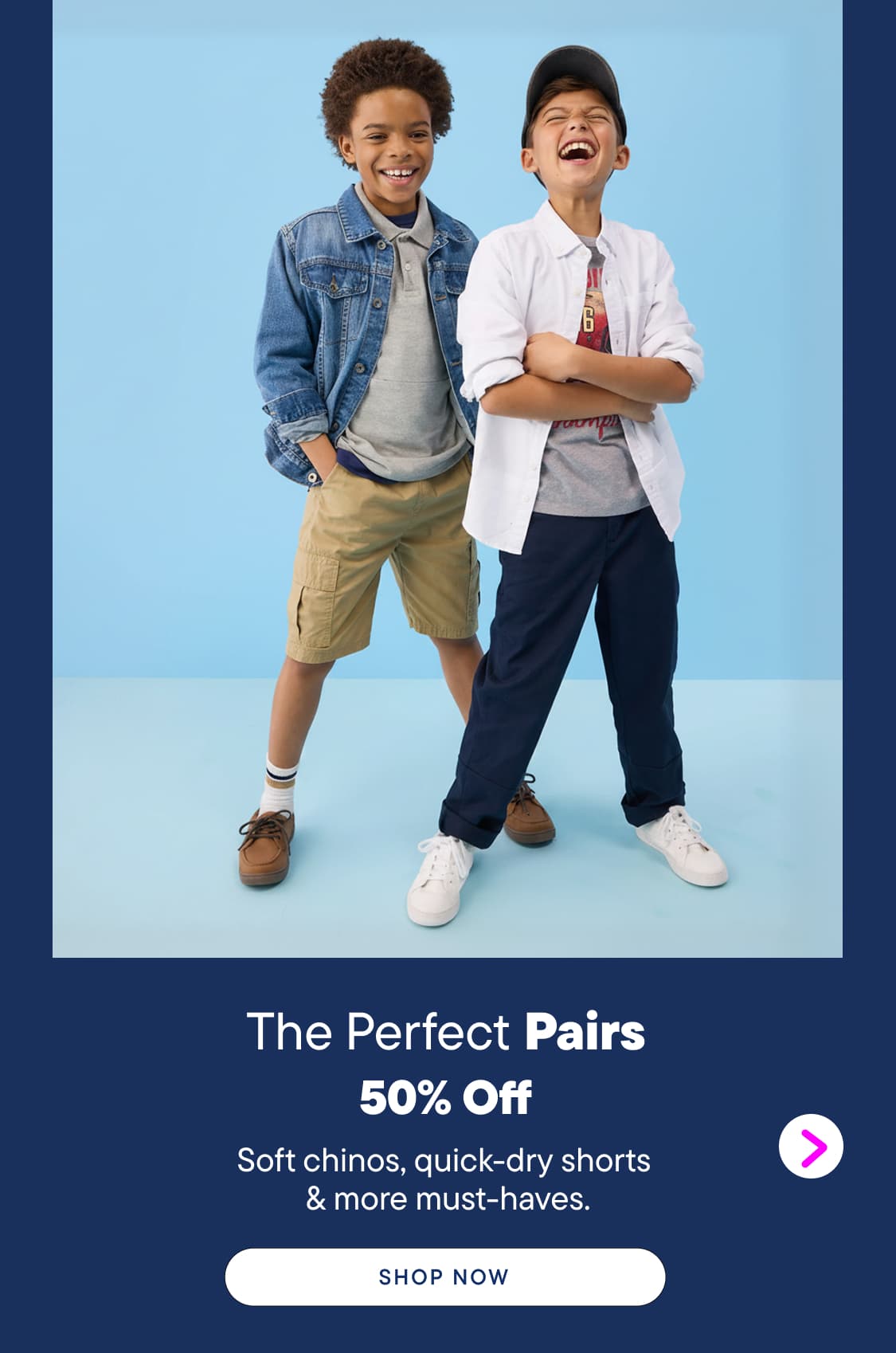 Two smiling boys in casual outfits stand against a bright blue background, with a promotional banner below advertising a sale on clothing.