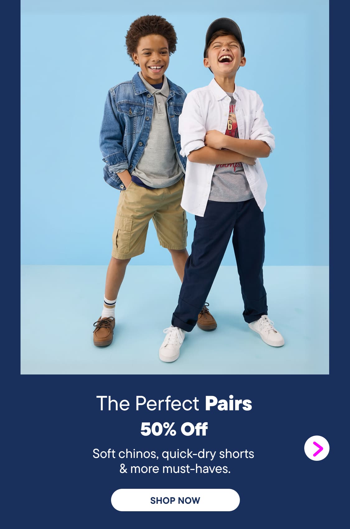 Two smiling boys in casual outfits stand against a bright blue background, with a promotional banner below advertising a sale on clothing.
