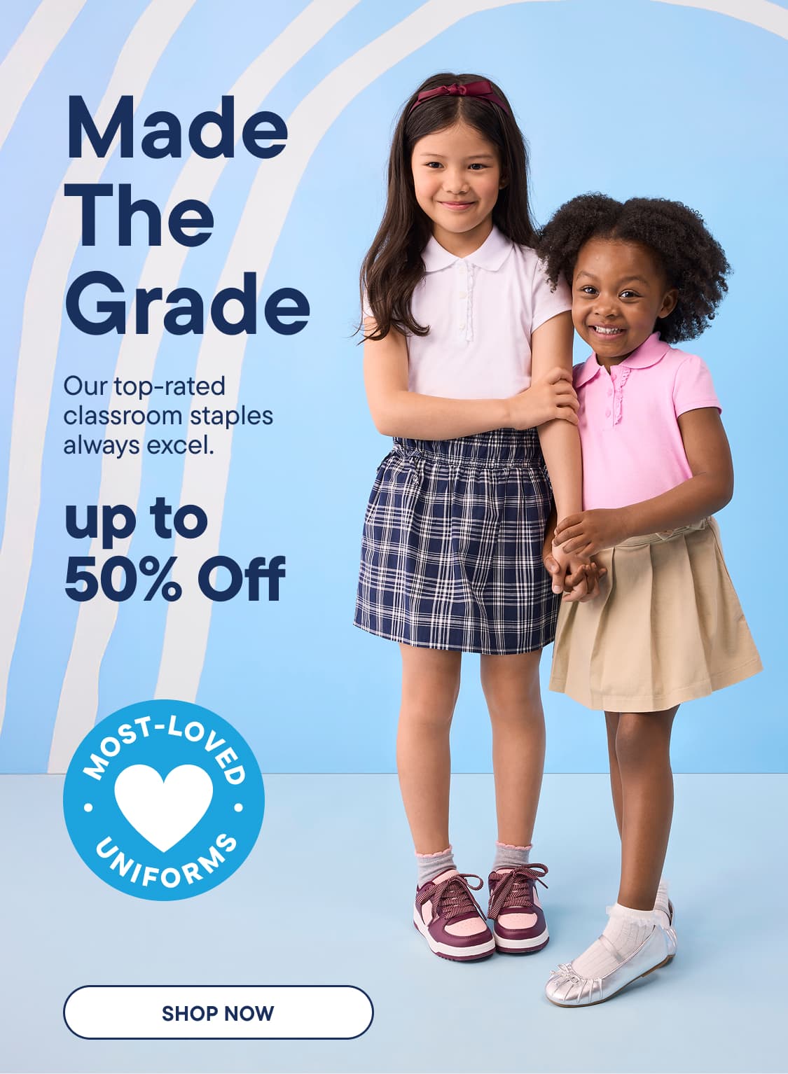 Two young girls in school uniforms stand in front of a blue background with white wavy lines and text advertising a sale.