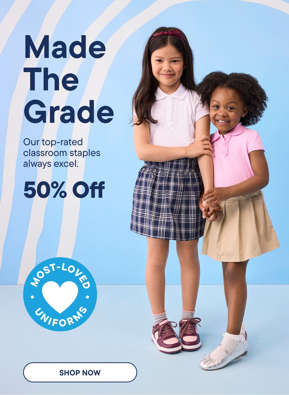 Two young girls in school uniforms stand in front of a blue background with white wavy lines and text advertising a sale.