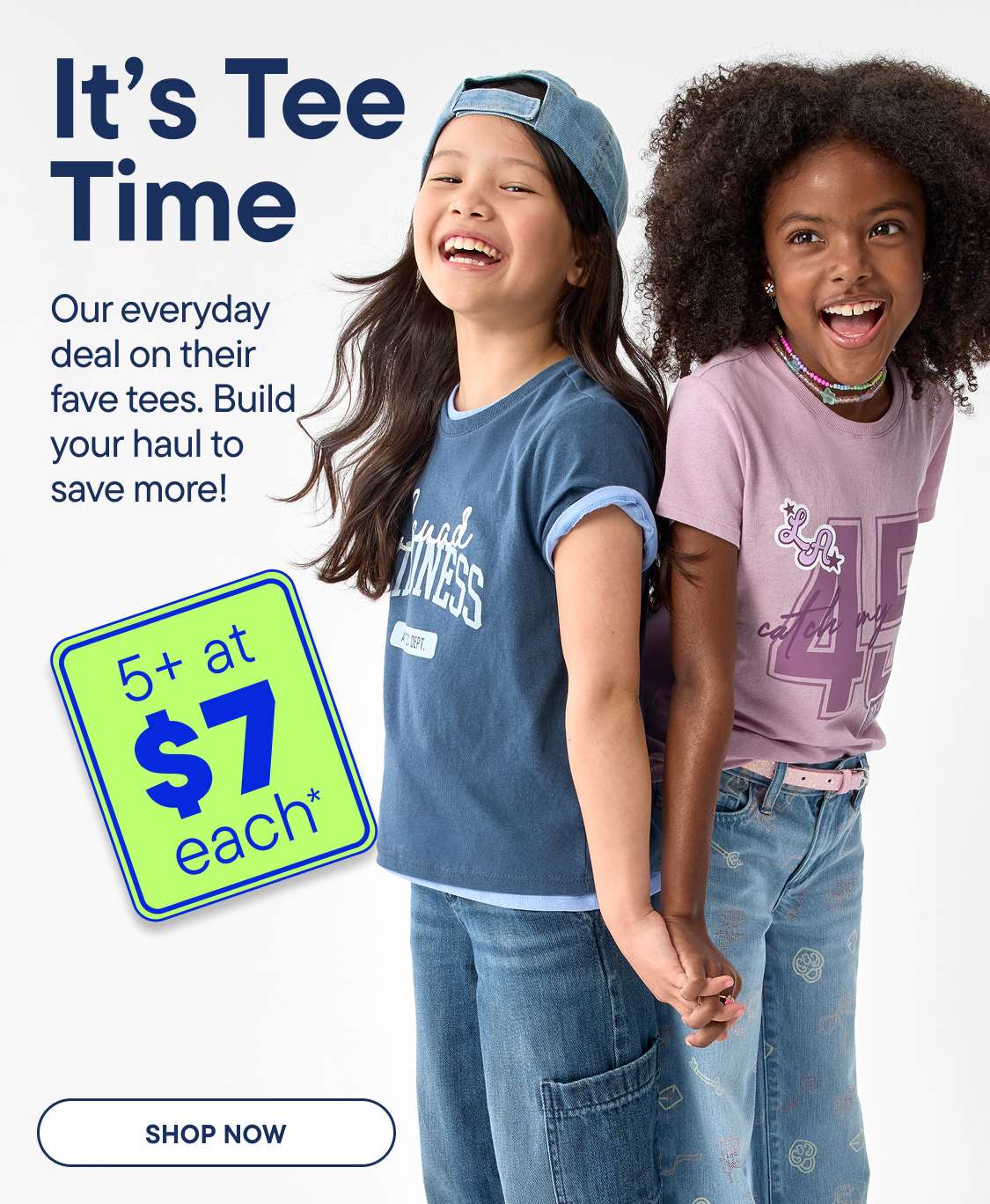 Two smiling girls in casual t-shirts and jeans stand in front of a light blue background with promotional text and a Shop Now button.