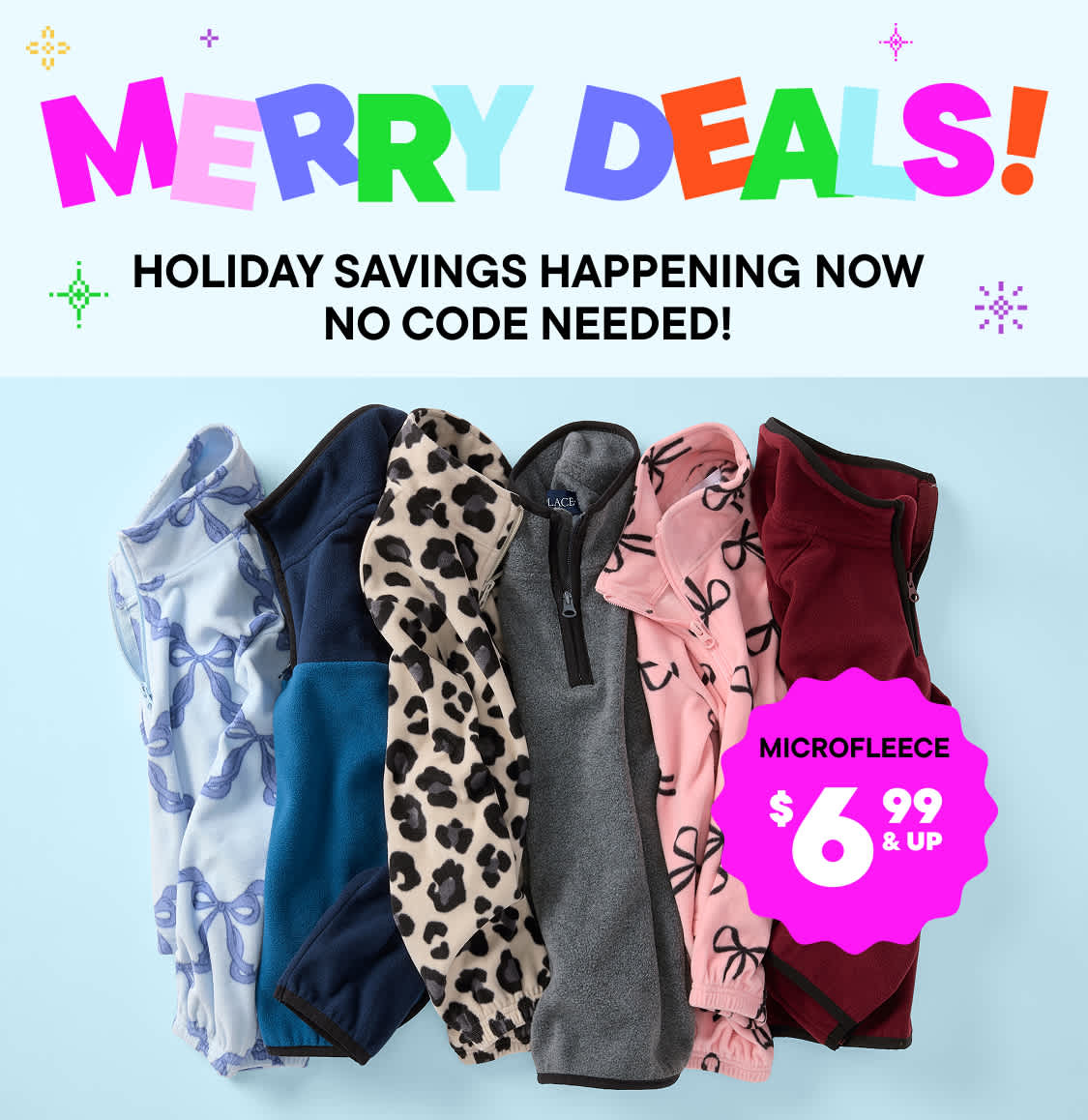 The image features three young women wearing casual, colorful clothing and posing together in front of a plain background. The women appear to be interacting with each other in a friendly and lively manner.