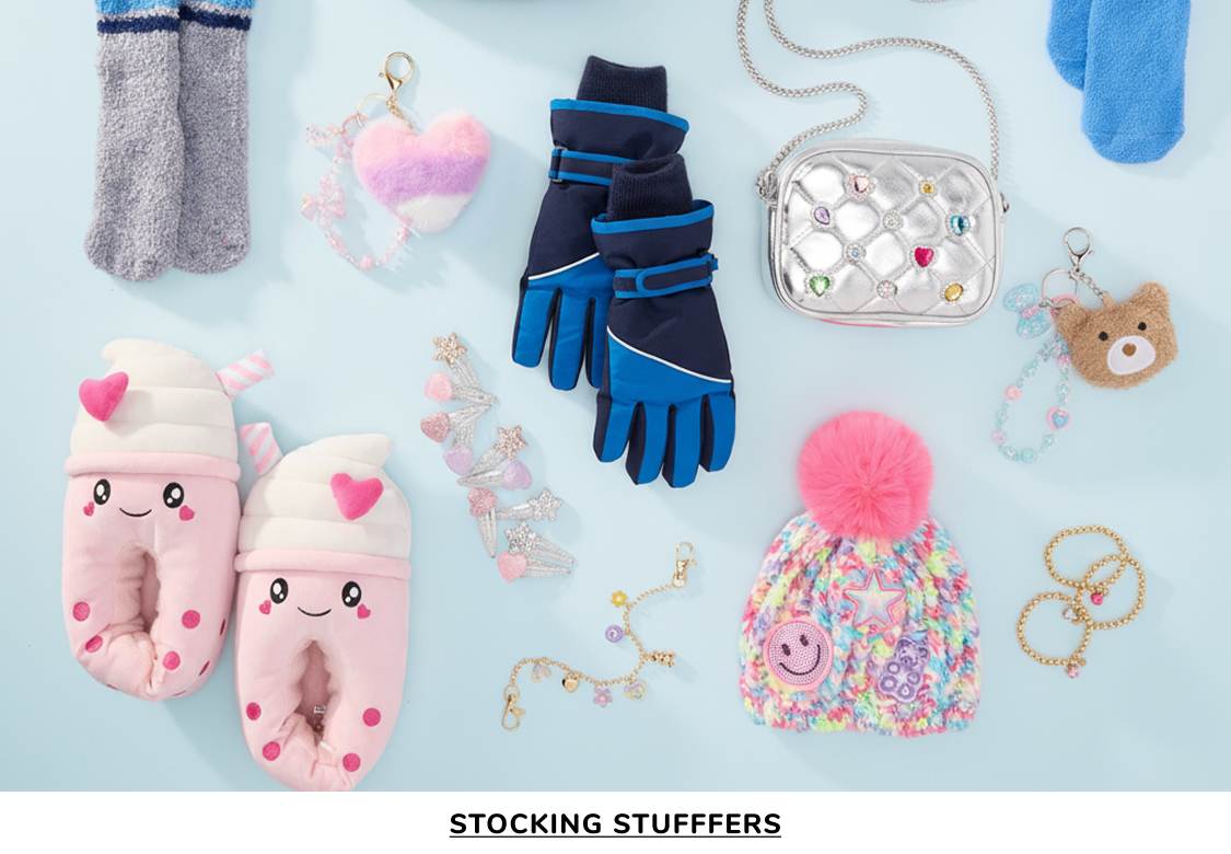 The image displays an assortment of winter accessories, including fuzzy socks, gloves, and a pom-pom hat, arranged against a light blue background.