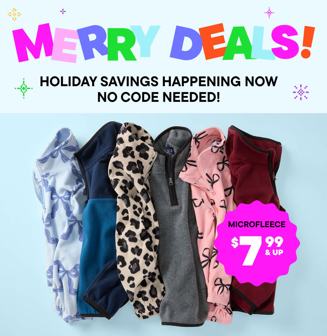 The image features three young women wearing casual, colorful clothing and posing together in front of a plain background. The women appear to be interacting with each other in a friendly and lively manner.