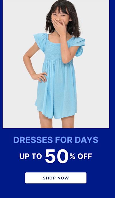 The image shows a young woman wearing a light blue dress with puff sleeves, covering her face with her hands and standing against a plain white background. The text overlay on the image advertises "DRESSES FOR DAYS" with a promotion of "UP TO 50% OFF" 