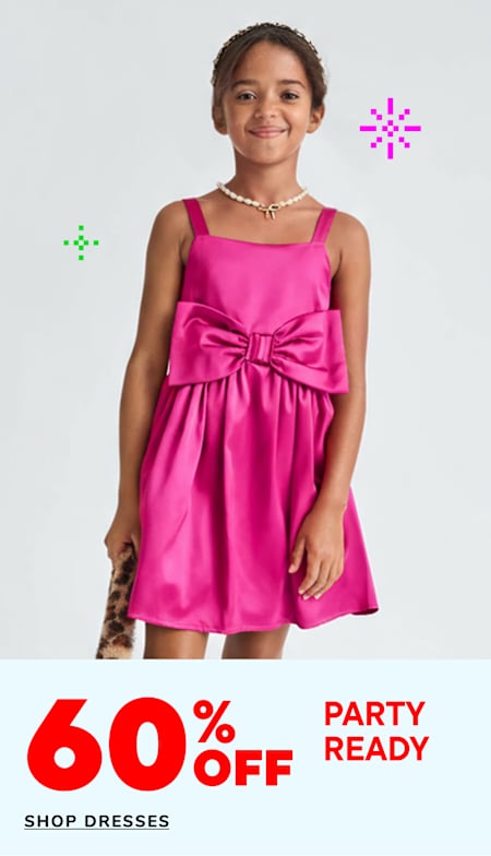 A young girl wearing a bright pink dress with a large bow stands in front of a plain white background, with colorful star-shaped graphics surrounding her.