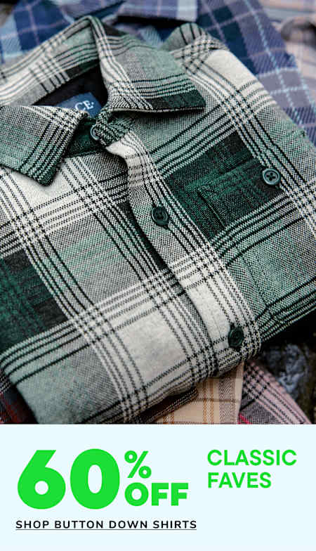 Two young children, a boy and a girl, are wearing matching beige hoodies and smiling at each other. The background is a plain white surface, and there are some colorful graphic elements in the corners.