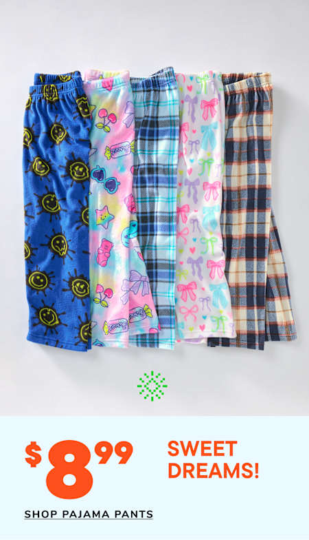 A collection of colorful and patterned pajama pants, including smiley faces, plaid, and floral designs, displayed on a white background with a price tag of $7.99 for "Sweet Dreams!" pajama pants.