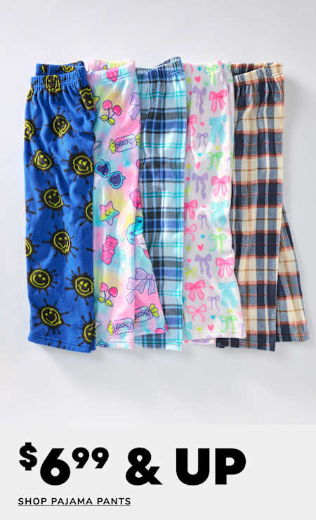 A collection of colorful and patterned pajama pants, including designs with smiley faces, plaid, and floral prints, displayed against a plain white background with a "60% OFF" promotional text.