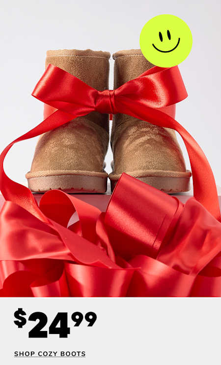 A pair of brown leather boots with laces and a smiley face sticker, against a plain background with a "60% OFF" text overlay.