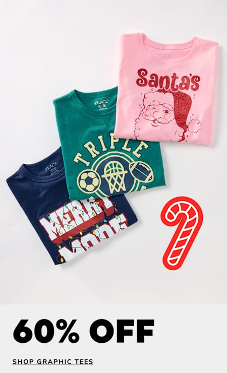 The image displays a collection of graphic t-shirts, including a pink shirt with a Santa Claus design, a green shirt with a "Trifle" logo, and a navy blue shirt with a "Merry Xmas" message. The shirts are accompanied by a red candy cane-shaped decoration, and the background features a 60-70% off sale promotion for graphic tees.