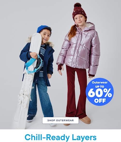 Two young girls wearing winter outfits and holding skis, with a large "XX% OFF" text overlay and a "SHOP OUTERWEAR" call-to-action in the background.