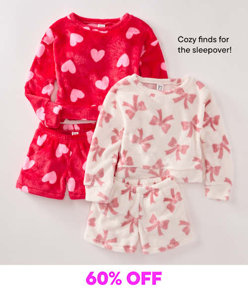 The image shows two character-themed t-shirts, one featuring the Incredible Hulk character in a red design for Valentine's Day, and the other featuring a pink cartoon character in a white design, both presented against a plain background with a 60% off sale text overlay.