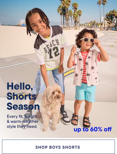 The image shows two young children, a boy and a girl, standing on a beach with palm trees in the background. The boy is wearing a "Beach 42" t-shirt and the girl is wearing a pink and white striped shirt. They are both smiling and appear to be enjoying the warm weather.