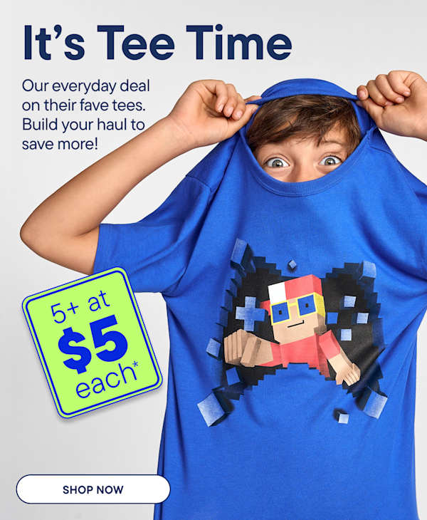 A young boy pulls a blue t-shirt with a pixelated character over his head, revealing a deal for 5+ at $5 each against a plain background.