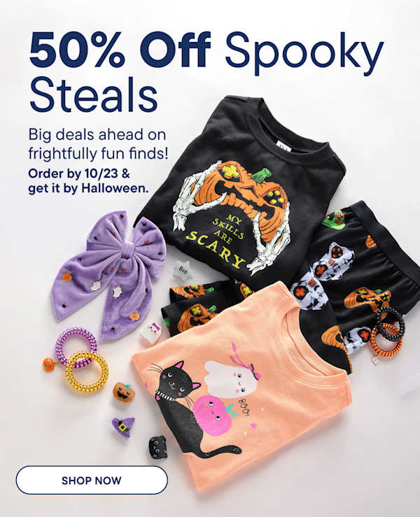 Halloween-themed children's clothing and accessories are arranged in the foreground against a plain white background | 50% Off Spooky Steals Big deals ahead on frightfully fun finds! Order by 10/23 & get it by Halloween.