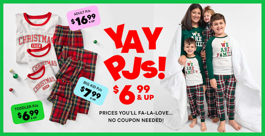 The image shows a group of people, likely friends or family, standing on a city street. They are wearing colorful, patterned clothing and appear to be shopping or browsing at a nearby store, as indicated by the price tags and signs in the foreground.